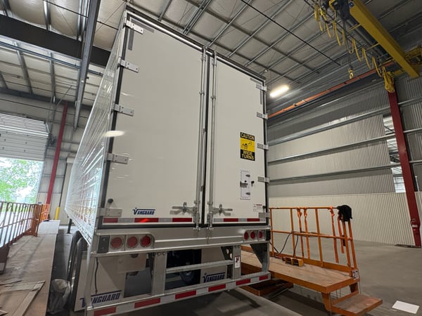 Finished Vanguard refrigerated trailer inside the Monon plant bay