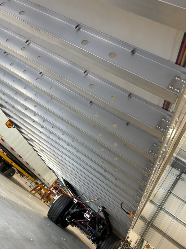 Hot-dip galvanized cross members on the underside of a Vanguard refrigerated trailer