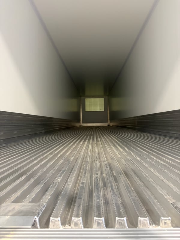 Smooth, full-length interior side walls of a Vanguard refrigerated trailer